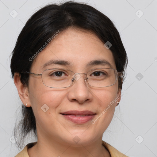 Joyful white adult female with medium  brown hair and brown eyes