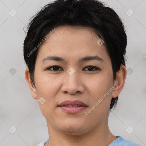 Joyful asian young-adult female with short  brown hair and brown eyes