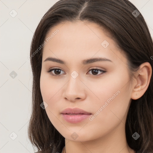 Neutral white young-adult female with long  brown hair and brown eyes