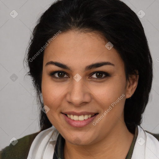 Joyful latino young-adult female with medium  brown hair and brown eyes