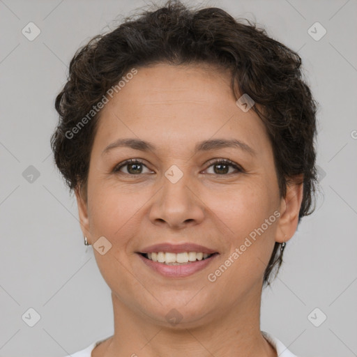 Joyful white adult female with short  brown hair and brown eyes