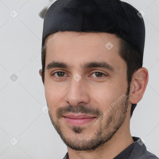 Joyful white young-adult male with short  black hair and brown eyes