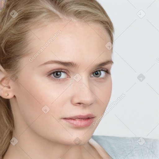 Neutral white young-adult female with long  brown hair and blue eyes