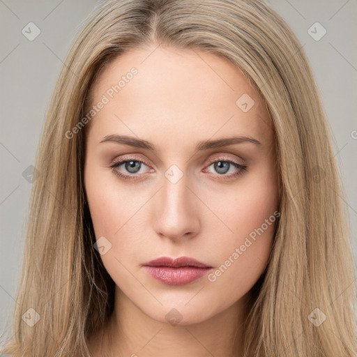 Neutral white young-adult female with long  brown hair and brown eyes