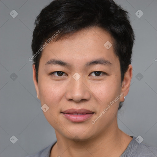 Joyful asian young-adult male with short  black hair and brown eyes