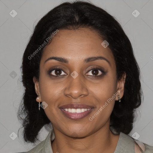 Joyful black young-adult female with medium  black hair and brown eyes