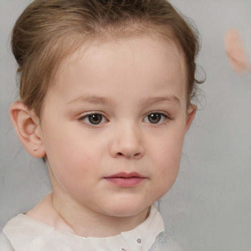 Neutral white child female with short  brown hair and brown eyes