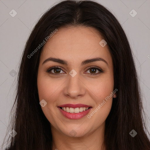 Joyful white young-adult female with long  brown hair and brown eyes