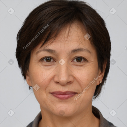 Joyful white adult female with medium  brown hair and brown eyes