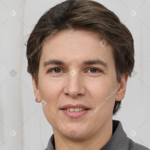 Joyful white adult female with short  brown hair and brown eyes