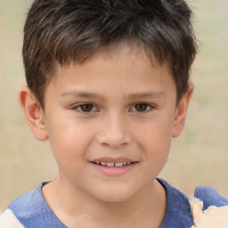 Joyful white child male with short  brown hair and brown eyes