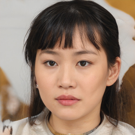 Neutral asian young-adult female with medium  brown hair and brown eyes