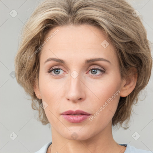 Neutral white young-adult female with medium  brown hair and grey eyes