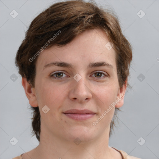 Joyful white young-adult female with short  brown hair and grey eyes