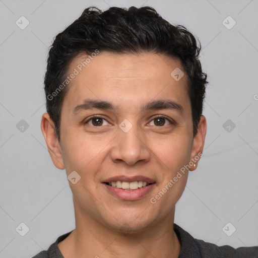 Joyful white young-adult male with short  black hair and brown eyes