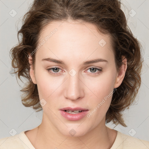 Joyful white young-adult female with medium  brown hair and green eyes