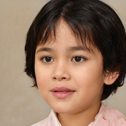 Joyful white child female with medium  brown hair and brown eyes