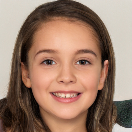 Joyful white child female with long  brown hair and brown eyes