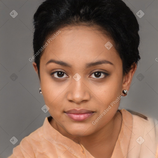 Joyful latino young-adult female with short  brown hair and brown eyes