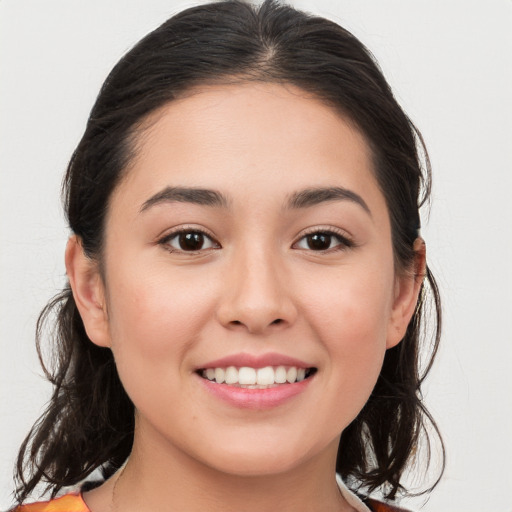 Joyful white young-adult female with medium  brown hair and brown eyes