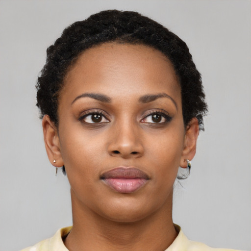 Neutral black young-adult female with short  black hair and brown eyes