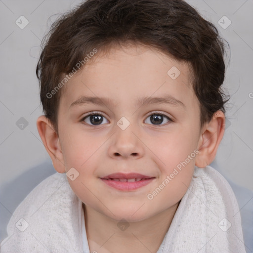 Joyful white child male with short  brown hair and brown eyes