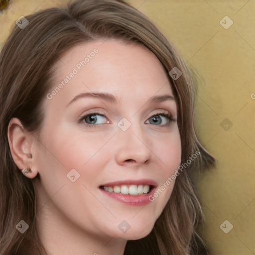 Joyful white young-adult female with long  brown hair and blue eyes