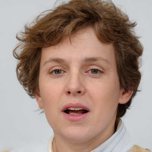 Joyful white young-adult male with medium  brown hair and brown eyes