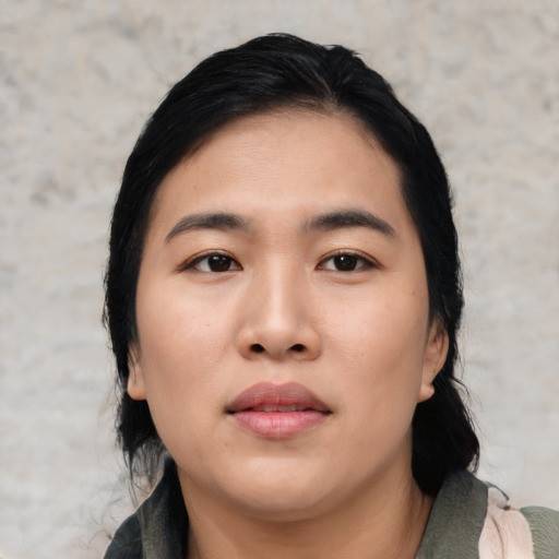 Neutral asian young-adult female with medium  black hair and brown eyes
