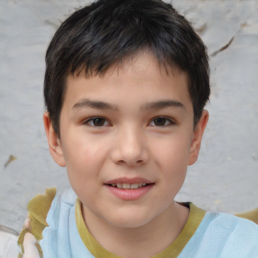 Joyful white child male with short  brown hair and brown eyes