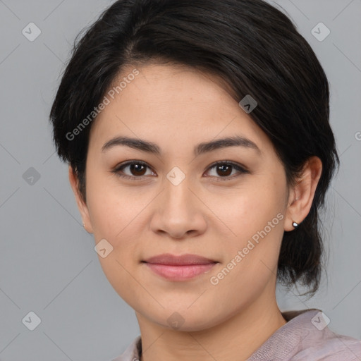 Joyful white young-adult female with medium  black hair and brown eyes