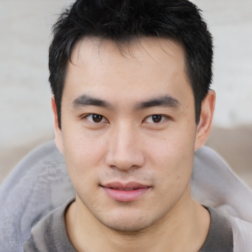 Neutral asian young-adult male with short  brown hair and brown eyes