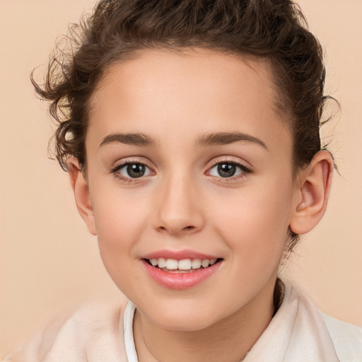 Joyful white child female with short  brown hair and brown eyes