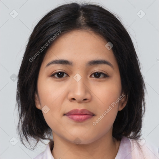 Joyful asian young-adult female with medium  brown hair and brown eyes