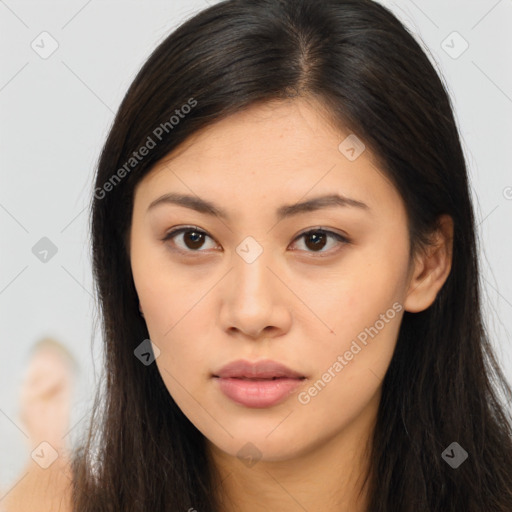 Neutral white young-adult female with long  brown hair and brown eyes