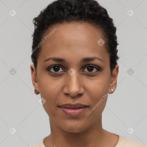 Joyful black young-adult female with short  brown hair and brown eyes