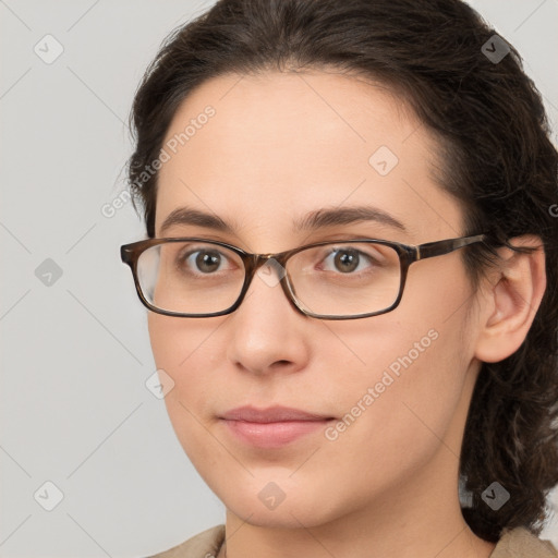 Neutral white young-adult female with medium  brown hair and brown eyes