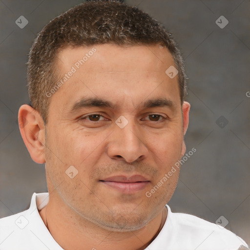 Joyful white adult male with short  brown hair and brown eyes