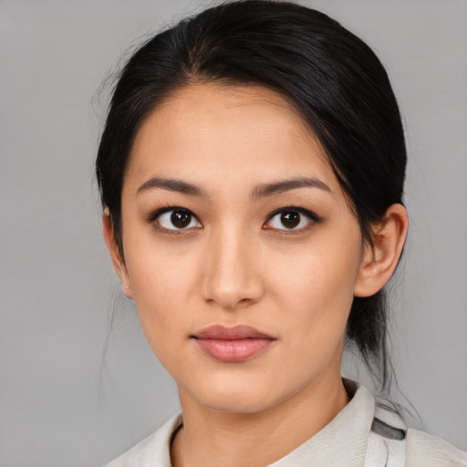 Neutral asian young-adult female with medium  black hair and brown eyes