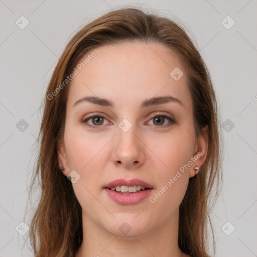 Joyful white young-adult female with long  brown hair and grey eyes