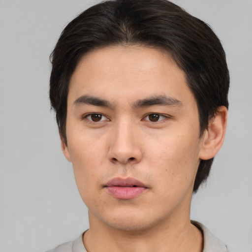 Neutral asian young-adult male with short  brown hair and brown eyes