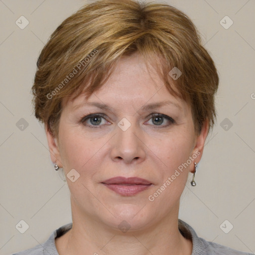 Joyful white adult female with medium  brown hair and grey eyes