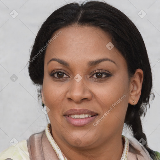 Joyful black adult female with medium  brown hair and brown eyes