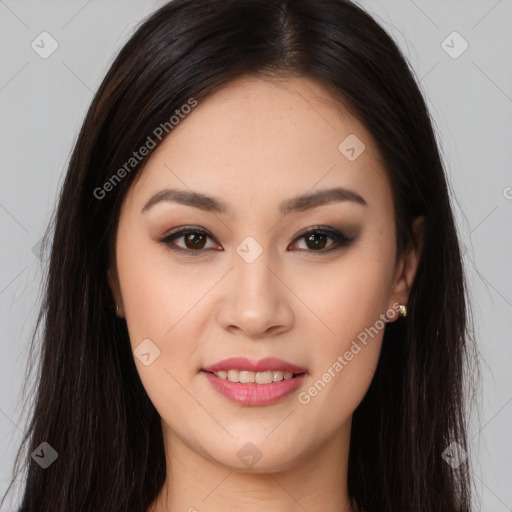 Joyful asian young-adult female with long  brown hair and brown eyes