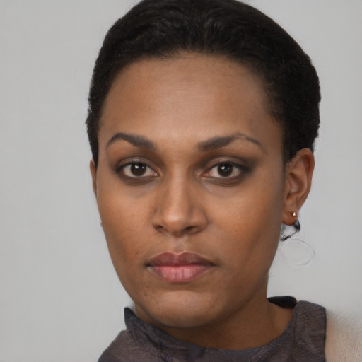 Neutral black young-adult female with short  black hair and brown eyes