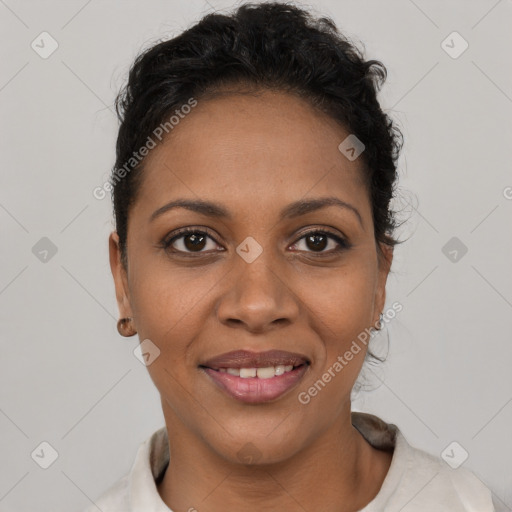 Joyful latino young-adult female with short  black hair and brown eyes