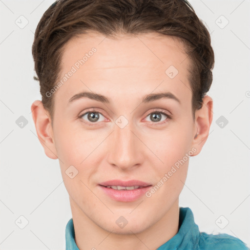 Joyful white young-adult female with short  brown hair and grey eyes