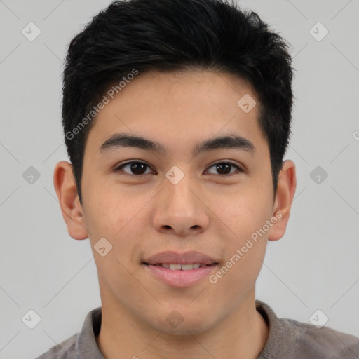 Joyful asian young-adult male with short  black hair and brown eyes