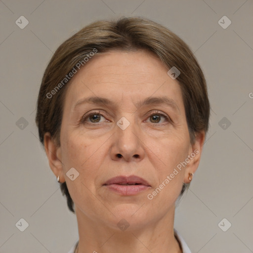 Joyful white adult female with short  brown hair and brown eyes