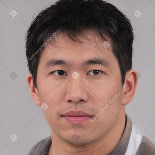 Neutral asian young-adult male with short  brown hair and brown eyes